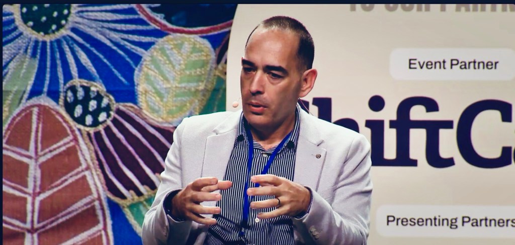 Jeramy Hope speaking during a panel discussion at the DSC Annual NDIS Conference in Brisbane.